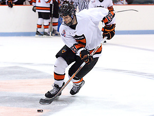 Andre Calof (Princeton - 18) carries the puck through the neutral zone against Quinnipiac at Hobey Baker Rink, in Princeton, NJ. (Shelley M. Szwast)