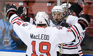 The visiting Merrimack College Warriors defeated the Northeastern University Huskies 4-3 (OT) on Friday, February 4, 2011, at Matthews Arena in Boston, Massachusetts. (Melissa Wade)