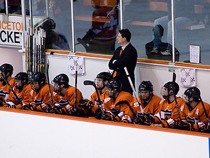 Coach Guy Gadowsky and the Princeton bench watch the action during the first period of their game against Dartmouth. (Shelley M. Szwast)