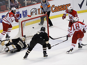 Miami Reilly Smith (18) scores a goal during the first period of the CCHA Championship game at Joe Louis Arena in Detroit, Michigan on March 19, 2011. (Rena Laverty)