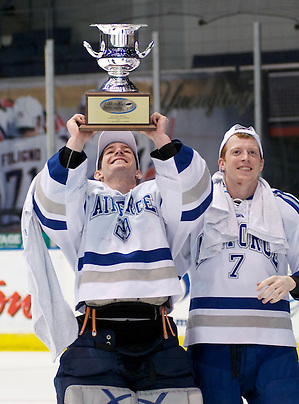 AHA tournament MVP Jason Torf and teammate Casey Kleisinger of Air Force celebrate their AHA championship victory over RIT (2012 Omar Phillips)