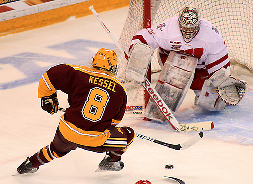 Minnesota's Amanda Kessel makes a move on Wisconsin goaltender Alex Rigsby.  Kessel scored 5-hole on Rigsby to give the Gophers a 1-0 lead. (2012 Dave Harwig)