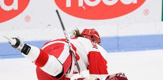 Britt Hergesheimer (BU - 2), Melissa Bizzari (BC - 4) - The visiting Boston College Eagles defeated the Boston University Terriers 3-1 on Saturday, November 5, 2011, at Walter Brown Arena in Boston, Massachusetts. (Melissa Wade)