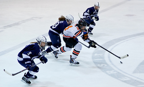 Fiona McKenna (Princeton - 24) plays the puck as Amy Petersen (Penn State - 9), Laura Bowman (Penn State - 18), and Micayla Catanzariti (Penn State - 10) give chase. (Shelley M. Szwast)