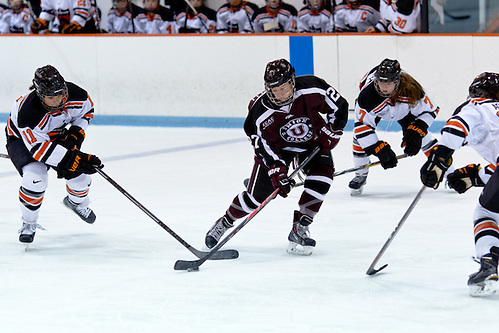 Kathryn Tomaselli (Union - 27) takes a shot as Kelsey Koelzer (Princeton - 11), Jaimie McDonell (Princeton - 7), and Emily Achterkirch (Princeton - 23) defend. (Shelley M. Szwast)