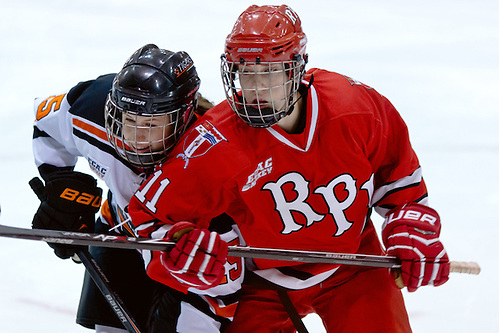 Brianna Leahy (Princeton - 15) and Alexa  Gruschow (Rensselaer - 11) battle for position after the faceoff. (Shelley M. Szwast)