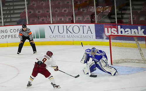 Austin Cangelosi of Boston College scores on a penalty shot, Air Force vs. Boston College 10-7-16, Icebreaker Tournament, Magness Arena, Denver, Colorado. (Candace Horgan)