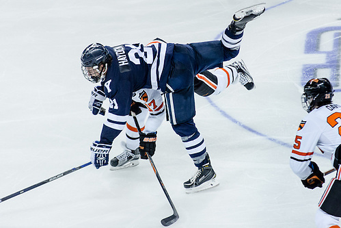 John Hayden (Yale - 21) and Garrett Skrbich (Princeton - 17) battle in the neutral zone. (Shelley M. Szwast)