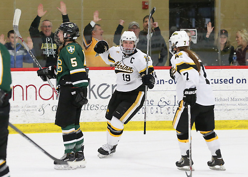 Adrian's Kalyn Schroka scores against St. Norbert (Mike Dickie)