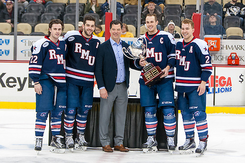 Robert Morris captains are presented with their second straight Three Rivers Classic trophy (Omar Phillips)