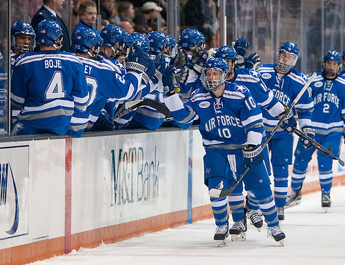 Air Force players celebrate a second period goal in a 3-2 win at RIT (Omar Phillips)