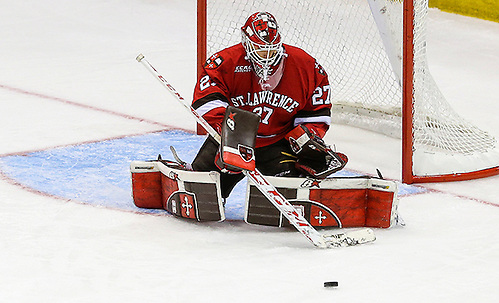 March 18, 2016:  St. Lawrence Saints goalie Kyle Hayton (27) makes save during 2016 ECAC Tournament Semifinal game between St. Lawrence University and Harvard University at Herb Brooks Arena in Lake Placid, NY. (John Crouch/J. Alexander Imaging)