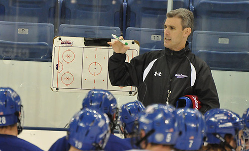 Massachusetts-Lowell coach Norm Bazin talks to players at a practice. (Bob Ellis)