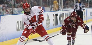 Abby Roque (Wisconsin-18) and Kenzie Kent (Boston College-12) in a semifinal game during the 2017 NCAA Frozen Four at Family Arena in St. Charles, Mo. (Don Adams Jr.)