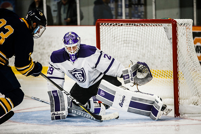 Benjamin Myers makes a save during a men's ice hockey game against the University of Wisconsin-Eau Claire on November 9, 2017, in the St. Thomas Ice Arena in Mendota Heights. UST won the game by a final score of 5-3. (Mark Brown/University of St. Thomas)