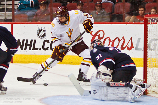 2016Jan10: Ryan Belonger (ASU - 16), Rob Nichols (UConn - 31). The UConn Huskies shut out the Arizona State Sun Devils 3-0 in the Consolation Game of the inaugural Desert Hockey Classic at Gila River Arena in Glendale, AZ. (©Rachel Lewis)