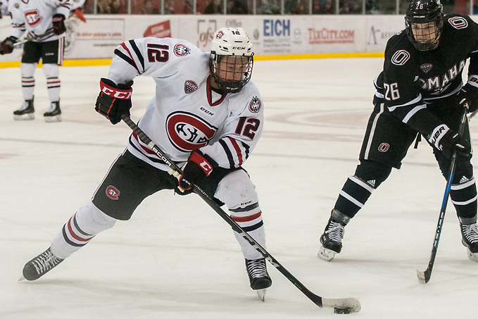 Jack Ahcan (SCSU-12) 2018 Feb. 02 St. Cloud State University hosts University of Nebraska Omaha in a NCHC contest at the Herb Brooks National Hockey Center in St. Cloud, MN (Bradley K. Olson)