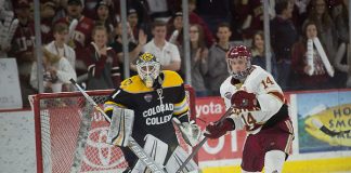 Alex Leclerc of Colorado College and Jarid Lukosevicius of Denver. Colorado College at Denver at Magness Arena, Feb. 17, 2018. (Candace Horgan)