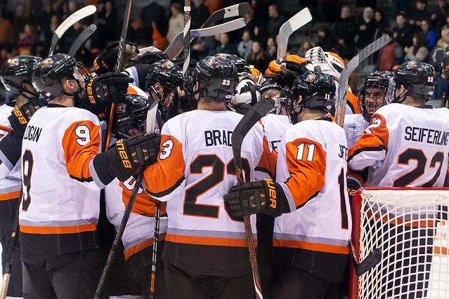 RIT players celebrate a last second win over Niagara (2019 Omar Phillips)