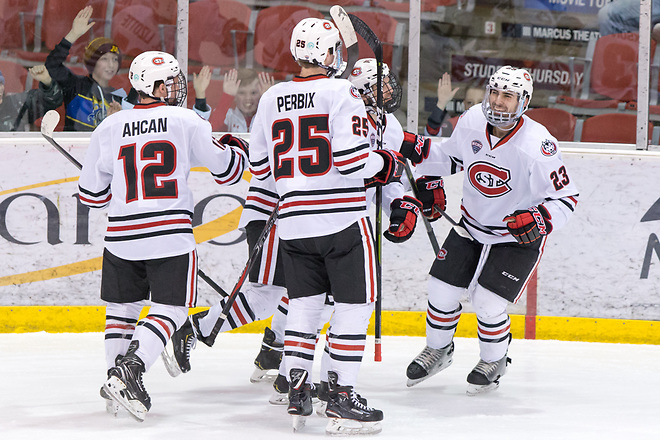 Robby Jackson (SCSU-23) Nick Perbix (SCSU-25) Jack Ahcan (SCSU-12) 2019 February 9 St. Cloud State University hosts Colorado College in a NCHC contest at the Herb Brooks National Hockey Center (Bradley K. Olson)