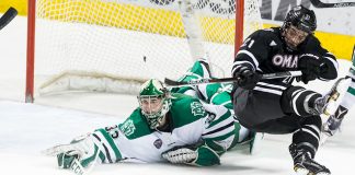 Cam Johnson (North Dakota-33) Ryan Galt (University Nebraska Omaha-21) 17 Feb.25 University Nebraska Omaha and the University of North Dakota meet in a NCHC game at the Ralph Engelstad Arena in Grand Forks, ND (Bradley K. Olson)