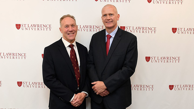 St. Lawrence director of athletics Bob Durocher (left) introduces new head coach Brent Brekke on May 25. (photo: St. Lawrence Athletics)