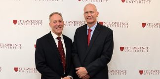 St. Lawrence director of athletics Bob Durocher (left) introduces new head coach Brent Brekke on May 25. (photo: St. Lawrence Athletics)