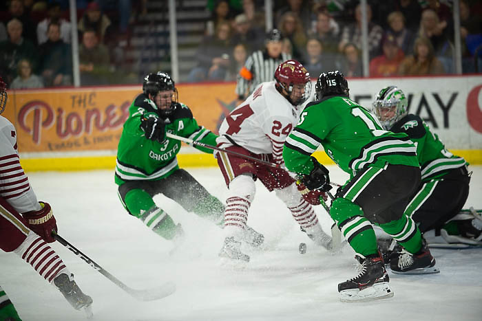 A pile in the crease as Denver's Bobby Brink tries for a rebound, North Dakota vs. Denver at Magness Arena, Nov. 15, 2019. (Candace Horgan)