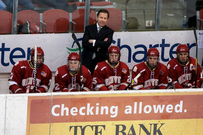 16 Dec 11: George Gwozdecky (Denver -Head Coach)  The St. Cloud State Huskies host the Denver University Pioneers in a WCHA match up at the National Hockey Center in St. Cloud, MN. (Jim Rosvold)