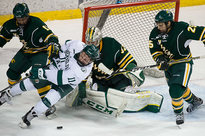 08 Dec 17: Adam Rockwood (Northern Michigan - 11), Charlie Combs (Bemidji State - 11), Mathias Israelsson (Northern Michigan - 32), Philip Beaulieu (Northern Michigan - 25). The Bemidji State University Beavers host the Northern Michigan University Wildcats in a WCHA Conference matchup at the Sanford Center in Bemidji, MN. (Jim Rosvold)
